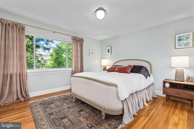 1850 Irving St NW, Washington, DC 20010 - bedroom featuring light wood finished floors and baseboards