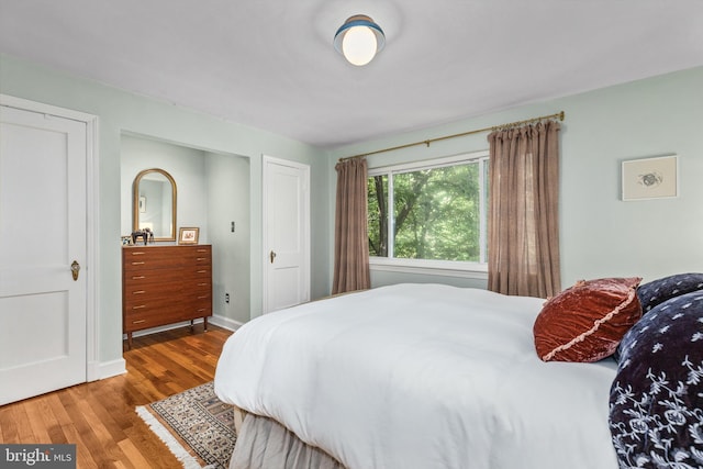 1850 Irving St NW, Washington, DC 20010 - bedroom with wood finished floors and baseboards