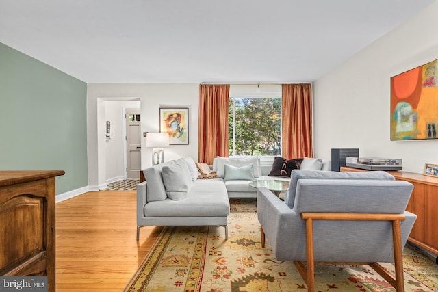 1850 Irving St NW, Washington, DC 20010 - living area featuring light wood-type flooring and baseboards
