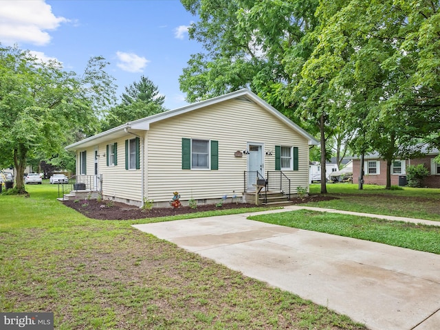 213 S 6th St, Denton, MD 21629 - view of front of property with a front lawn
