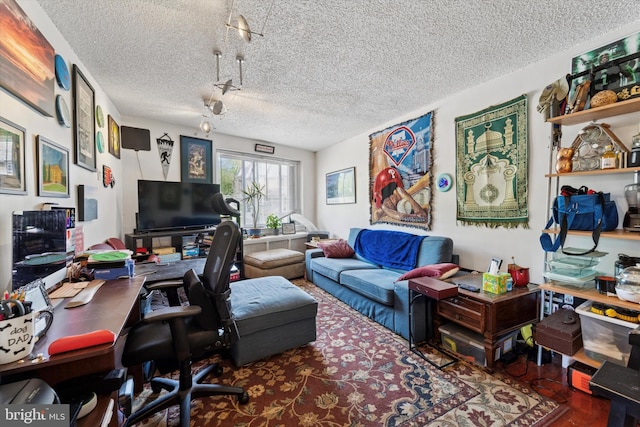 3 W Gowen Ave, Philadelphia, PA 19119 - office area with a textured ceiling and track lighting