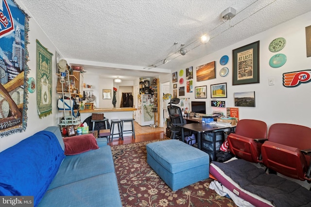 3 W Gowen Ave, Philadelphia, PA 19119 - living area featuring a textured ceiling