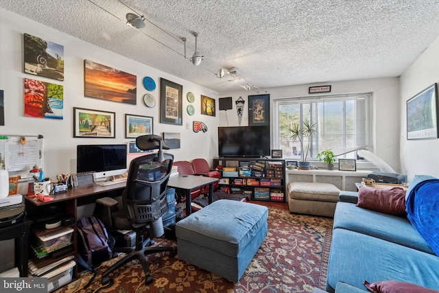 3 W Gowen Ave, Philadelphia, PA 19119 - living room with a desk and a textured ceiling