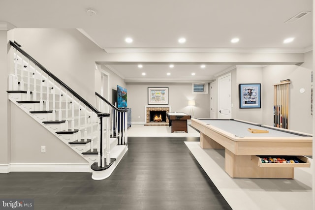13300 Manor Stone Dr, Darnestown, MD 20874 - game room featuring ornamental molding, a brick fireplace, dark wood-style floors, recessed lighting, and billiards table