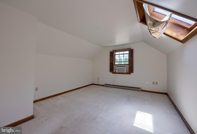 1549 Willoughby Cir, Manheim, PA 17545 - additional living space with baseboard heating, cooling unit, light carpet, and vaulted ceiling