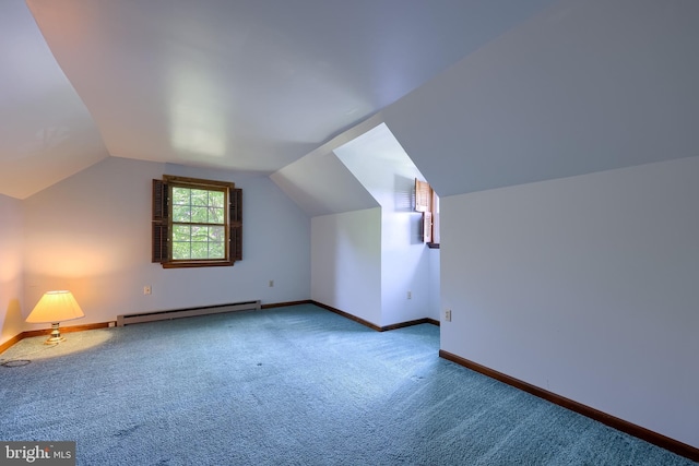 1549 Willoughby Cir, Manheim, PA 17545 - additional living space with a baseboard heating unit, carpet, and vaulted ceiling