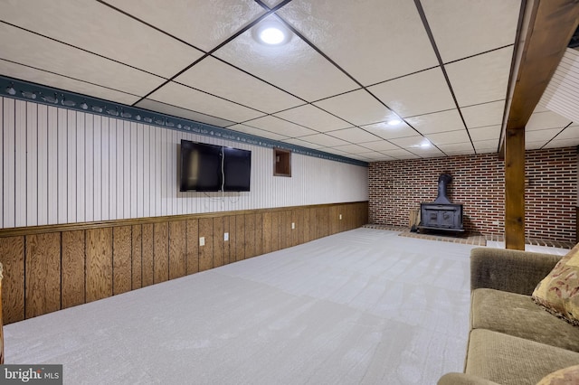1549 Willoughby Cir, Manheim, PA 17545 - finished below grade area with carpet flooring, a wood stove, wainscoting, and a drop ceiling