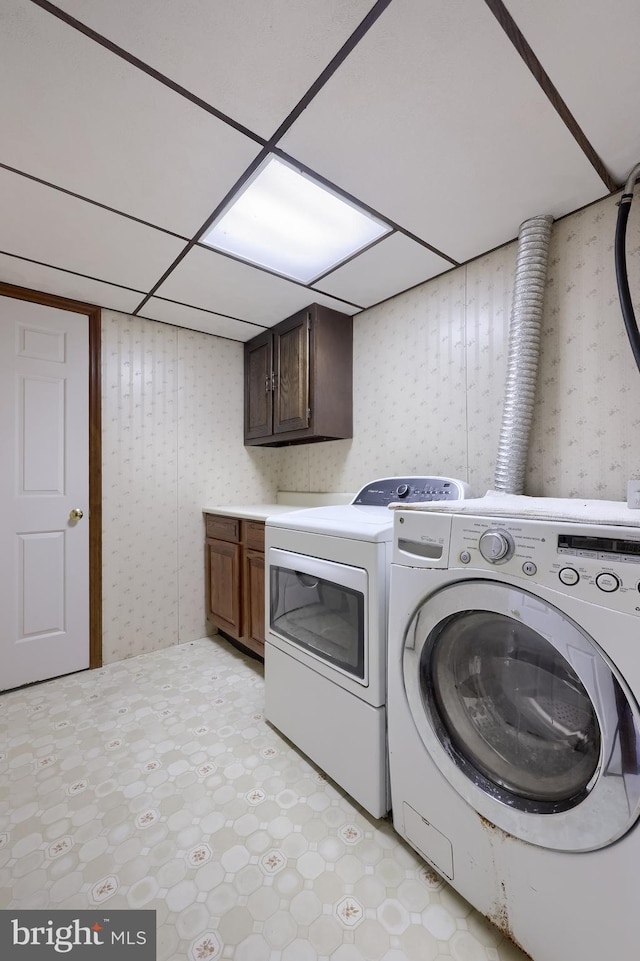 1549 Willoughby Cir, Manheim, PA 17545 - washroom featuring cabinet space, wallpapered walls, light flooring, and washing machine and dryer