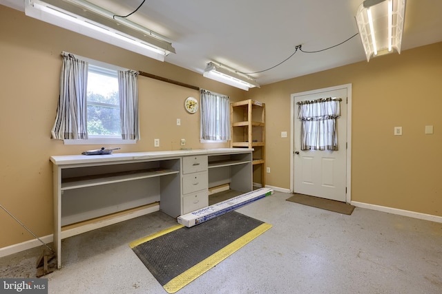1549 Willoughby Cir, Manheim, PA 17545 - garage featuring an office area and baseboards