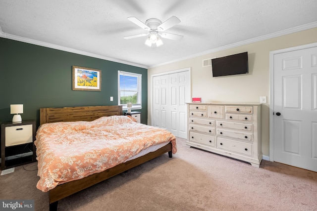 2997 Patapsco Rd, Finksburg, MD 21048 - bedroom featuring carpet floors, crown molding, a closet, ceiling fan, and a textured ceiling