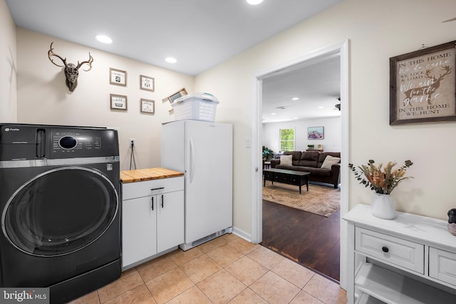 2997 Patapsco Rd, Finksburg, MD 21048 - laundry room featuring washer / clothes dryer, cabinet space, recessed lighting, and light tile patterned flooring