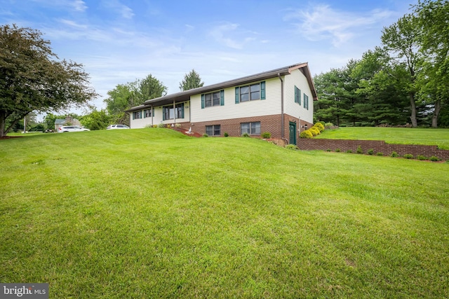 2997 Patapsco Rd, Finksburg, MD 21048 - view of front facade with a front yard and brick siding