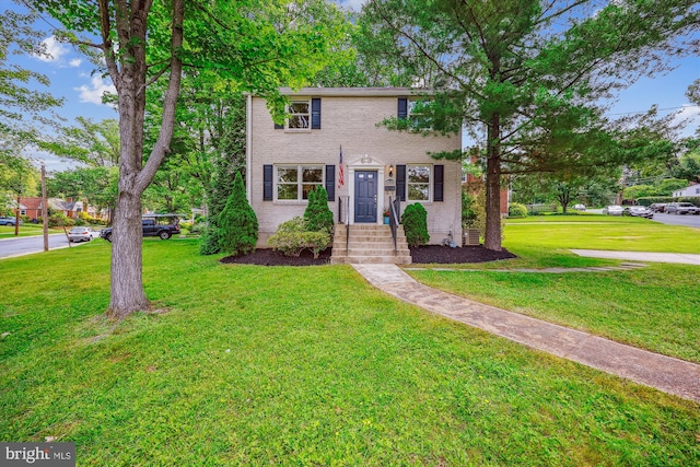 2610 Parker Ave, Silver Spring, MD 20902 - view of front facade with a front lawn and brick siding