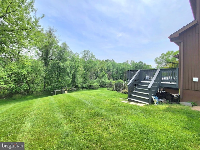 3747 Spring Lake Ln, Owings Mills, MD 21117 - view of grassy yard with a deck and stairway
