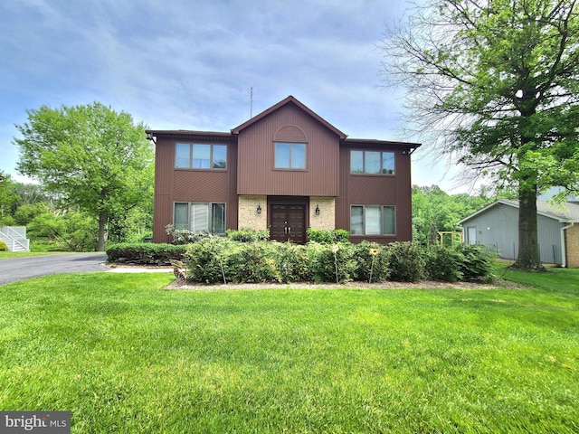 3747 Spring Lake Ln, Owings Mills, MD 21117 - townhome / multi-family property with a front yard