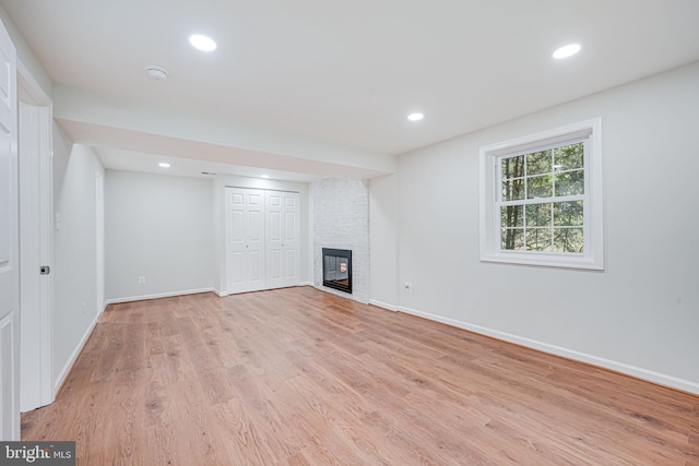 4721 Springbrook Dr, Annandale, VA 22003 - unfurnished living room featuring light wood-type flooring, a fireplace, and recessed lighting