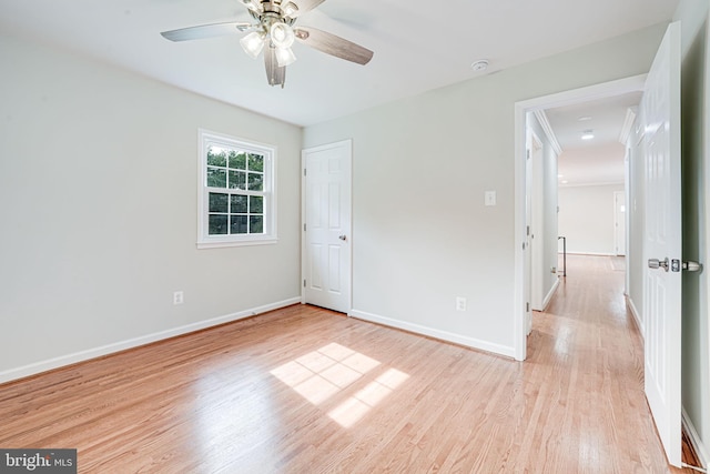 4721 Springbrook Dr, Annandale, VA 22003 - spare room with light wood-style flooring, a ceiling fan, and a smoke detector