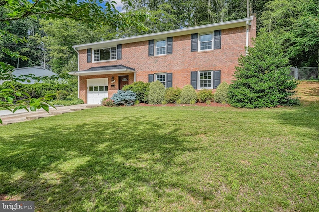 4721 Springbrook Dr, Annandale, VA 22003 - view of front facade featuring an attached garage, driveway, and brick siding