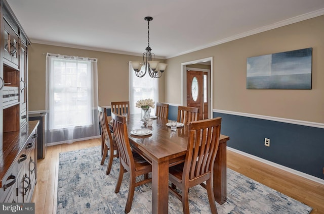 365 Newgate Rd, Langhorne, PA 19047 - dining room with a chandelier, light wood finished floors, and ornamental molding