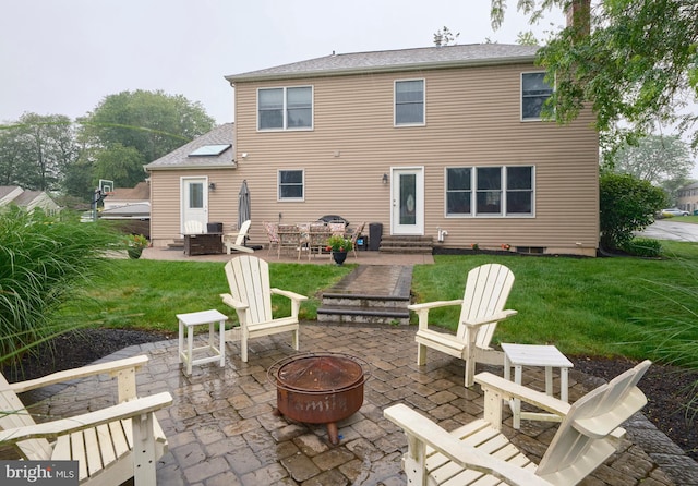 365 Newgate Rd, Langhorne, PA 19047 - back of property featuring a fire pit, entry steps, a patio, and a yard