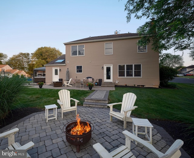 365 Newgate Rd, Langhorne, PA 19047 - rear view of property with an outdoor fire pit, a patio area, a lawn, and entry steps