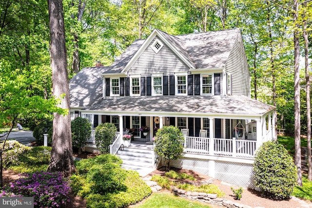 1399 Old Quincy Ln, Reston, VA 20194 - view of front facade with covered porch and roof with shingles