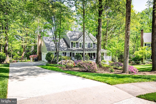 1399 Old Quincy Ln, Reston, VA 20194 - view of front of house featuring driveway and a porch