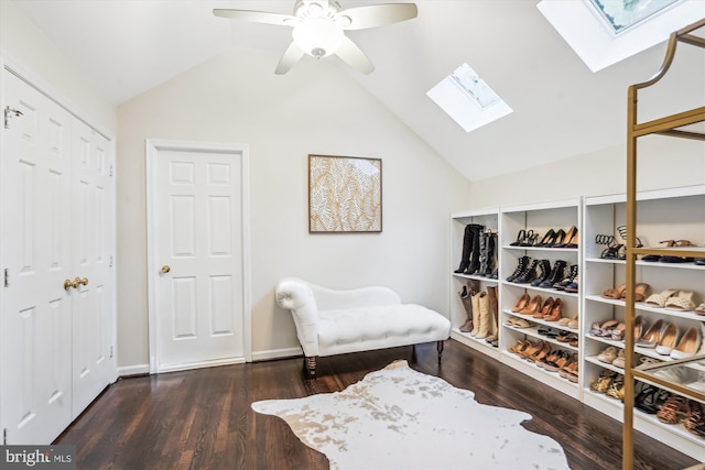 1399 Old Quincy Ln, Reston, VA 20194 - living area with a skylight, vaulted ceiling, wood finished floors, and a ceiling fan