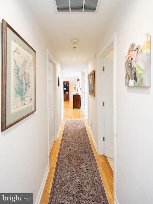 304 Academy St Unit 202, Cambridge, MD 21613 - hall with light wood-type flooring and recessed lighting
