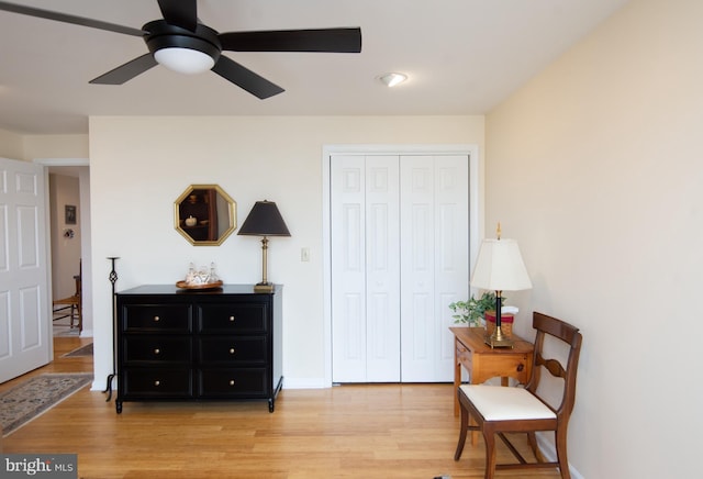 304 Academy St Unit 202, Cambridge, MD 21613 - sitting room with light wood finished floors and ceiling fan