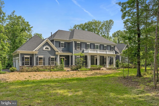 80 Shackelford Well Rd, Fredericksburg, VA 22406 - georgian-style home with a balcony, a front lawn, and a shingled roof