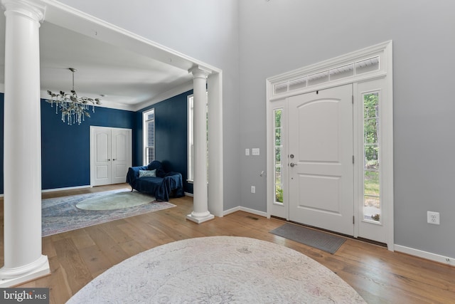 80 Shackelford Well Rd, Fredericksburg, VA 22406 - foyer featuring decorative columns, wood-type flooring, and a chandelier