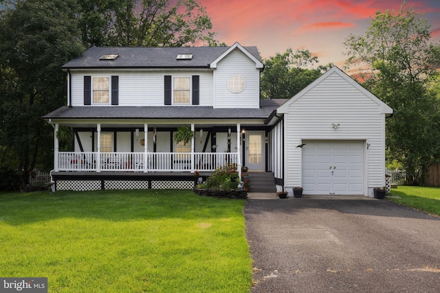 12 Pamela Ct, Jackson, NJ 08527 - view of front of home with an attached garage, driveway, a porch, and a yard