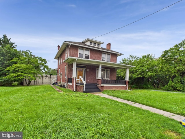 3437 Market St, Camp Hill, PA 17011 - traditional style home with a chimney, brick siding, and a porch