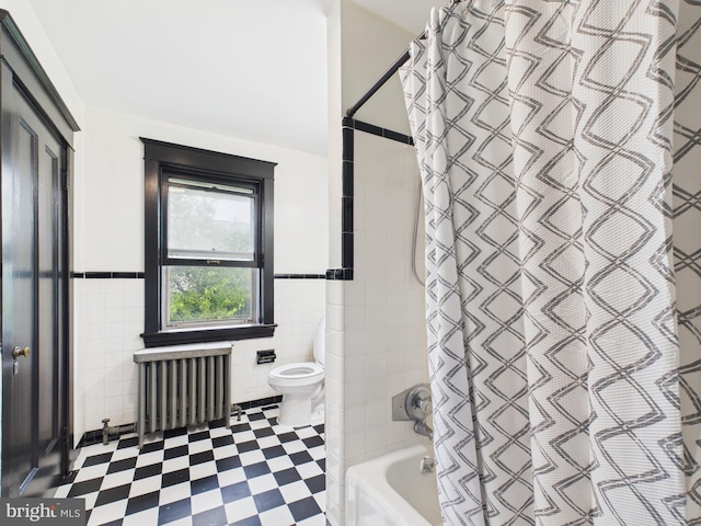 3437 Market St, Camp Hill, PA 17011 - bathroom with radiator, tile walls, shower / bath combo with shower curtain, tile patterned floors, and a wainscoted wall
