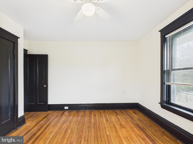 3437 Market St, Camp Hill, PA 17011 - spare room with healthy amount of natural light, wood-type flooring, and ceiling fan