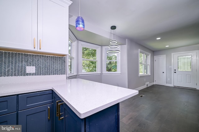 8808 Edmonston Rd, College Park, MD 20740 - kitchen featuring blue cabinets, white cabinets, backsplash, dark wood-type flooring, and recessed lighting