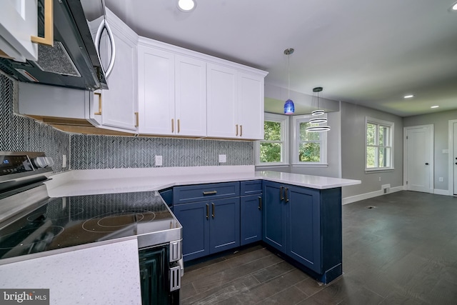 8808 Edmonston Rd, College Park, MD 20740 - kitchen with electric range, blue cabinets, white cabinetry, decorative backsplash, and recessed lighting