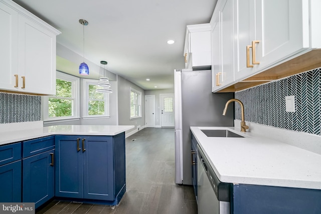 8808 Edmonston Rd, College Park, MD 20740 - kitchen with blue cabinetry, stainless steel dishwasher, dark wood-style flooring, white cabinetry, and recessed lighting