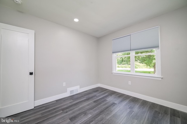 8808 Edmonston Rd, College Park, MD 20740 - unfurnished room featuring dark wood-style floors, recessed lighting, and a smoke detector
