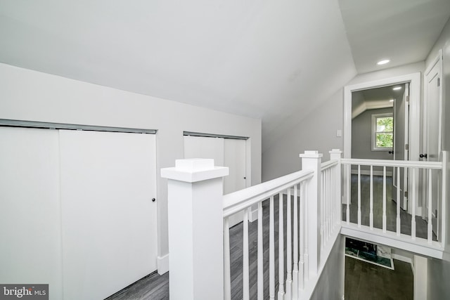 8808 Edmonston Rd, College Park, MD 20740 - corridor with an upstairs landing, wood finished floors, lofted ceiling, and recessed lighting
