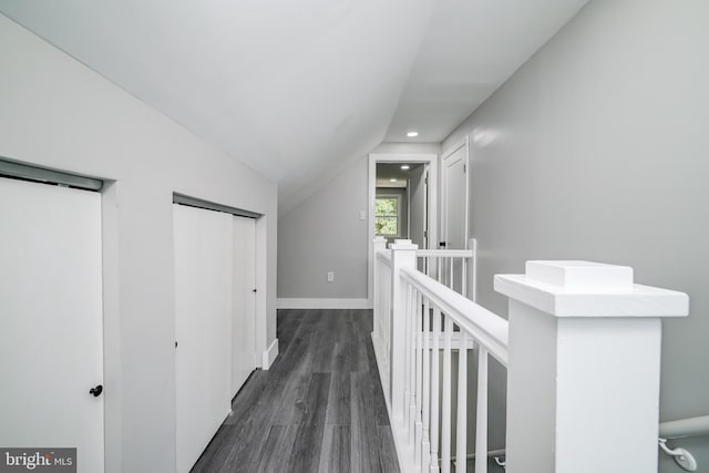 8808 Edmonston Rd, College Park, MD 20740 - hall with an upstairs landing, dark wood-style floors, lofted ceiling, and recessed lighting