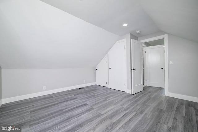 8808 Edmonston Rd, College Park, MD 20740 - bonus room featuring lofted ceiling, wood finished floors, and recessed lighting