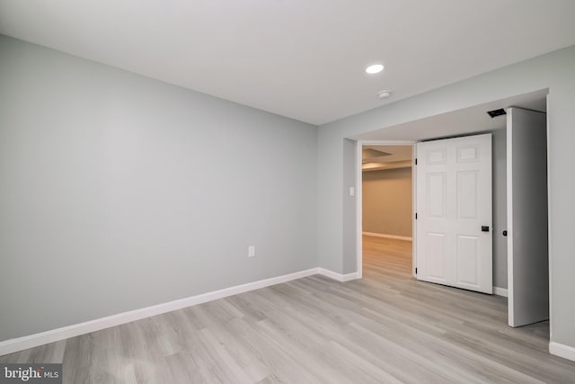 8808 Edmonston Rd, College Park, MD 20740 - unfurnished bedroom with light wood finished floors and recessed lighting