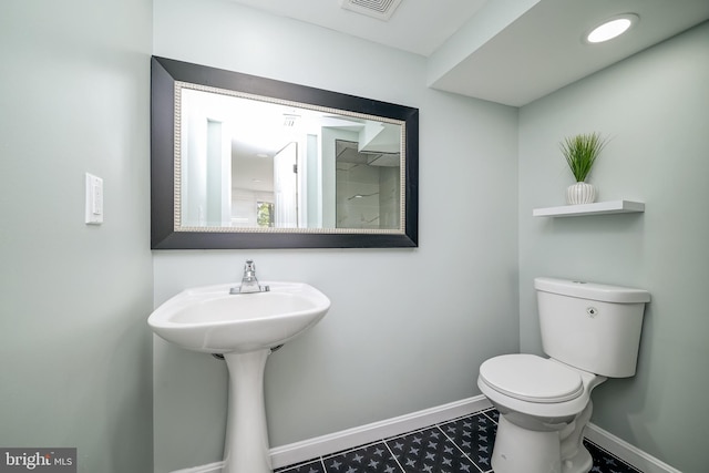 8808 Edmonston Rd, College Park, MD 20740 - bathroom with baseboards