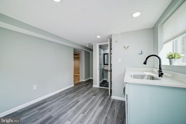 8808 Edmonston Rd, College Park, MD 20740 - kitchen featuring wood finished floors, light countertops, and recessed lighting