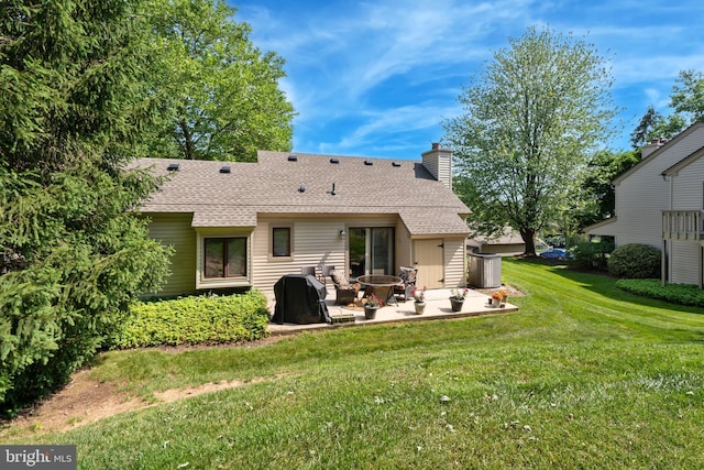 74 Ashton Way Unit 74, West Chester, PA 19380 - rear view of house with a patio, a chimney, roof with shingles, and a lawn