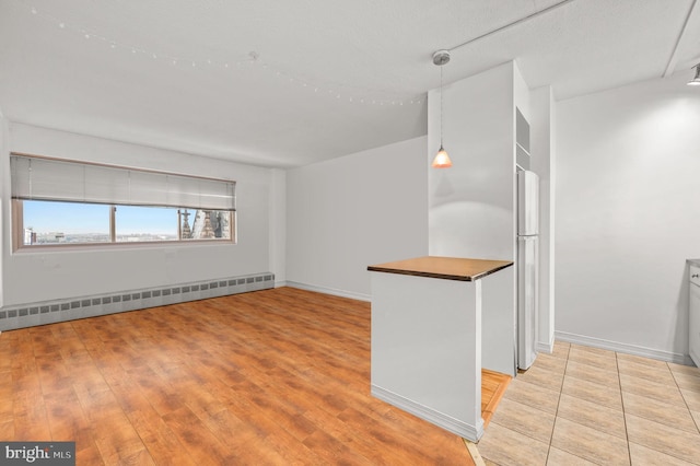 2101 Chestnut St Unit 1613, Philadelphia, PA 19103 - unfurnished room featuring baseboard heating and light wood finished floors