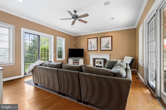 1214 Hunt Seat Dr, Lower Gwynedd, PA 19002 - living room featuring ceiling fan, light wood finished floors, ornamental molding, a brick fireplace, and recessed lighting