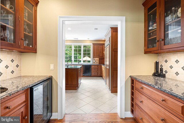 1214 Hunt Seat Dr, Lower Gwynedd, PA 19002 - indoor bar with beverage cooler, dishwasher, tasteful backsplash, light tile patterned floors, and recessed lighting